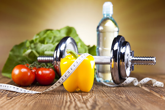 healthy-life-style-kit-including-dumbells-and-fruit